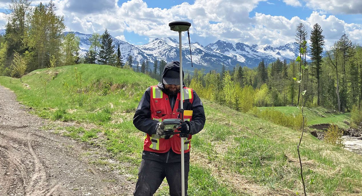 High-precision topographical surveying for steep terrain and land development projects in the Kootenay region of BC by Runnalls Denby.
